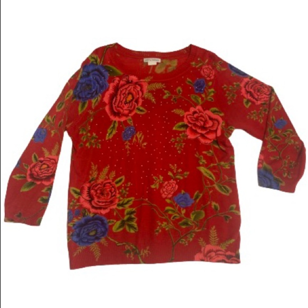 Beautiful sweater in XL. Material: 100% acrylic.